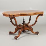 A MID VICTORIAN FIGURED WALNUT CENTRE TABLE.