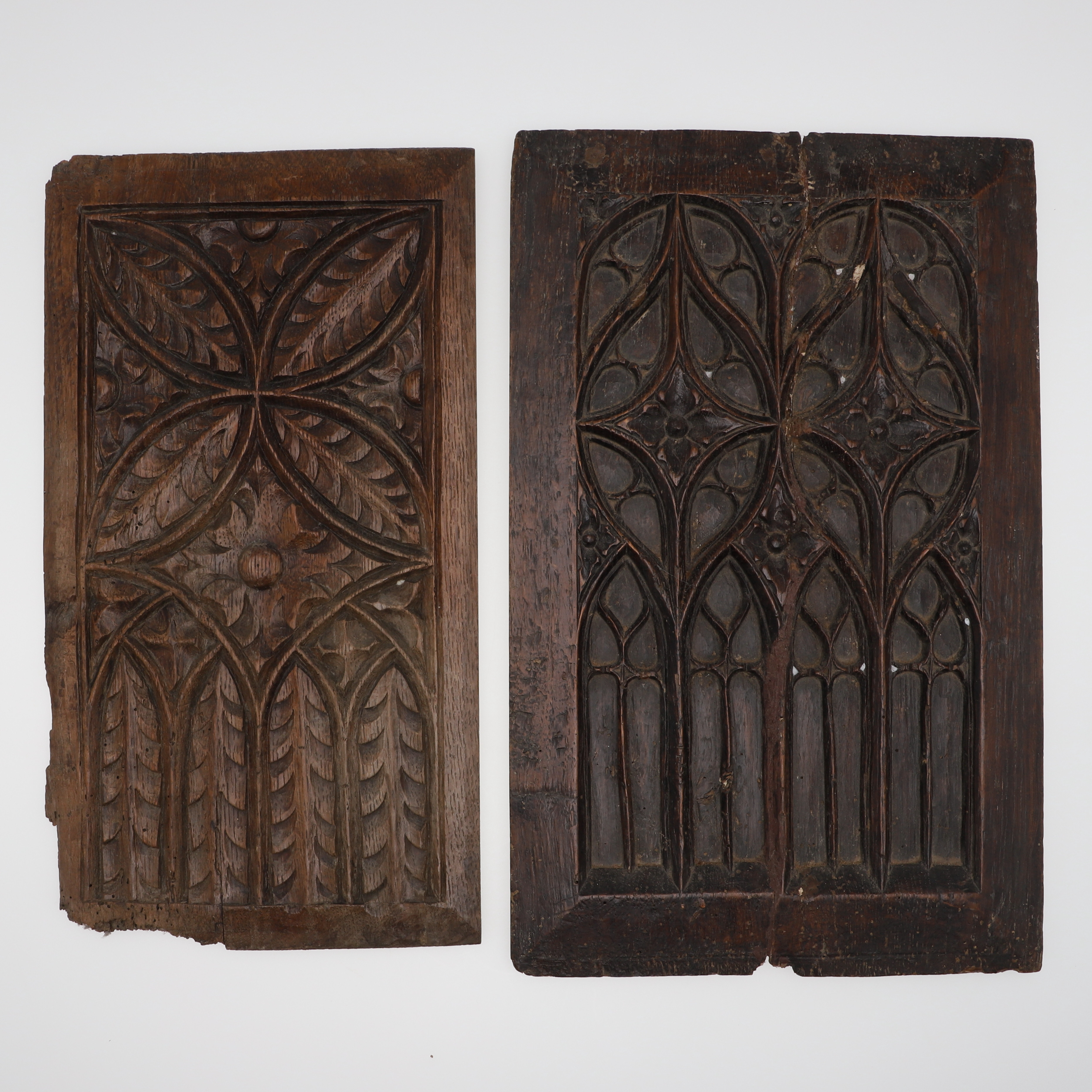 A GOTHIC CARVED OAK PANEL.