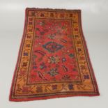 AN USHAK OR DONEGAL RUG, CIRCA 1900.