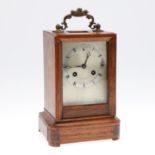 A 19TH CENTURY FRENCH ROSEWOOD MANTEL CLOCK.