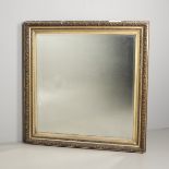 AN EARLY 20TH CENTURY SQUARE WALL MIRROR.