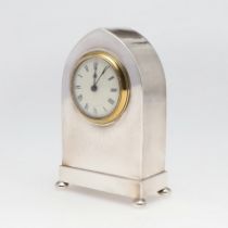 AN EARLY 20TH CENTURY SILVER DESK CLOCK.