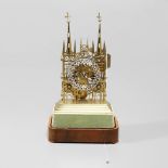 A LATE 19TH CENTURY BRASS CATHEDRAL SKELETON CLOCK.