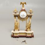A FRENCH MARBLE AND GILT METAL ARCHITECTURAL CLOCK.