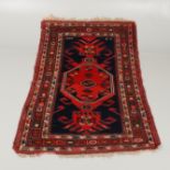 A CAUCASIAN RUG, CIRCA 1910.