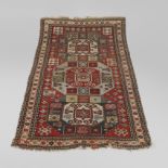 A KAZAK/KARABAGH RUG, CENTRAL/SOUTH CAUCASUS, CIRCA 1890.