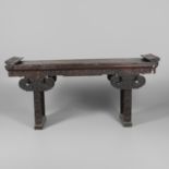 A CHINESE CARVED HARDWOOD ALTAR TABLE.