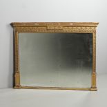 A LATE REGENCY GILT OVERMANTEL MIRROR.