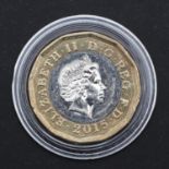 A 2015 ROYAL MINT TRIAL PIECE Â£1.00 COIN.