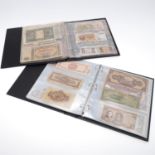 TWO ALBUMS OF WORLD BANKNOTES.