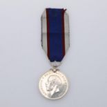 A GEORGE V ROYAL FLEET RESERVE LONG SERVICE AND GOOD CONDUCT MEDAL.