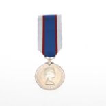 AN ELIZABETH II ROYAL FLEET RESERVE LONG SERVICE AND GOOD CONDUCT MEDAL.