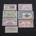 AN EXTENSIVE COLLECTION OF ARMED FORCES BANKNOTES.