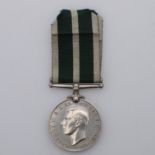 A GEORGE VI ROYAL NAVAL RESERVE LONG SERVICE AND GOOD CONDUCT MEDAL.