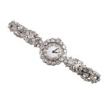 A LADY'S DIAMOND COCKTAIL WRISTWATCH.