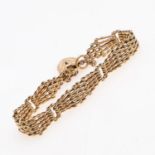 A 9CT GOLD FANCY GATE LINK BRACELET.