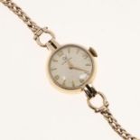 A LADY'S 9CT GOLD WRISTWATCH BY CERTINA.