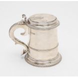 AN EARLY 20TH CENTURY TANKARD.