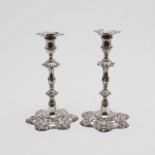 A PAIR OF LATE GEORGE II CAST CANDLESTICKS.