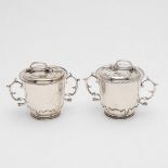 A PAIR OF EDWARDIAN BRITANNIA-STANDARD TWO-HANDLED CUPS & COVERS.