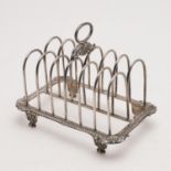 A GEORGE III TOAST RACK.