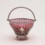 A GEORGE III SWING-HANDLED SUGAR BASKET.