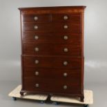 AN EARLY 19TH CENTURY MAHOGANY CHEST ON CHEST.