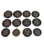 TWELVE VICTORIAN BRONZED CIRCULAR PORTRAIT PLAQUES.