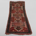 AN UNUSUAL SEWAN KAZAK RUG, CENTRAL CAUCASUS, CIRCA 1910.