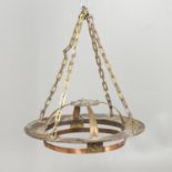 AN ARTS AND CRAFTS COPPER AND BRASS HANGING LIGHT.