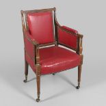 AN EARLY 19TH CENTURY MAHOGANY LIBRARY CHAIR.
