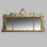 A 19TH CENTURY GILT OVER MANTEL MIRROR.