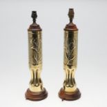 A PAIR OF WWI TRENCH ART BRASS TABLE LAMPS.