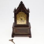 A 19TH CENTURY ROSEWOOD MANTEL TIMEPIECE.
