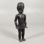 TRIBAL INTEREST - A LARGE CARVED ARTICULATED FIGURE.
