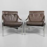 PIEFF - PAIR OF DESIGNER LEATHER ARMCHAIRS DESIGNED BY TIM BATES.