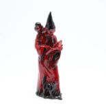 A ROYAL DOULTON POTTERY FLAMBE FIGURE OF 'THE WIZARD'.