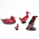 THREE ROYAL DOULTON FLAMBE DUCKS & A PENGUIN.