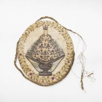 A LATE 18TH/ EARLY 19TH CENTURY NEEDLEWORK MEDALLION.