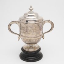AN EDWARDIAN TWO-HANDLED CUP & COVER.