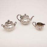 A LATE 19TH/ EARLY 20TH CENTURY NORTH AMERICAN THREE-PIECE TEA SET.