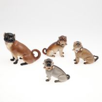 PORCELAIN MODELS OF PUG DOGS.