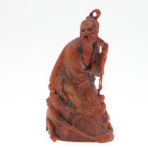 CHINESE CARVED BUFFALO HORN FIGURE.