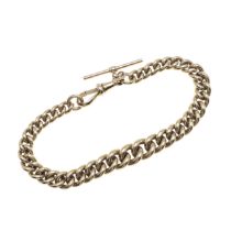 A 9CT GOLD CURB LINK BRACELET.