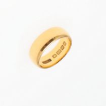 A 22CT GOLD WEDDING BAND. 9.8 grams, size N 1/2. *CR With some wear and scratches.