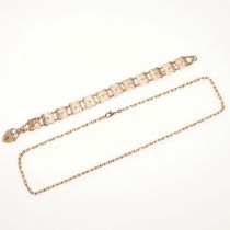 A 9CT GOLD FANCY LINK BRACELET.