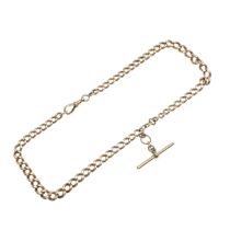A 9CT GOLD CURB LINK WATCH CHAIN.
