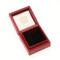 A SMALL LEATHER JEWELLERY BOX BY CARTIER.