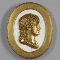 A 19TH CENTURY OVAL MARBLE AND GILT METAL PORTRAIT PLAQUE.