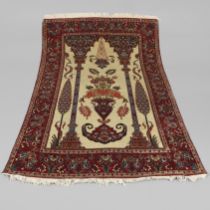 A KASHAN PRAYER RUG, CENTRAL PERSIA, CIRCA 1940.